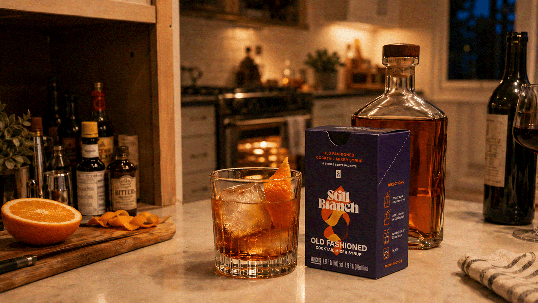 A weeknight Old Fashioned made with a Still Branch packet, bourbon, and ice in a rocks glass