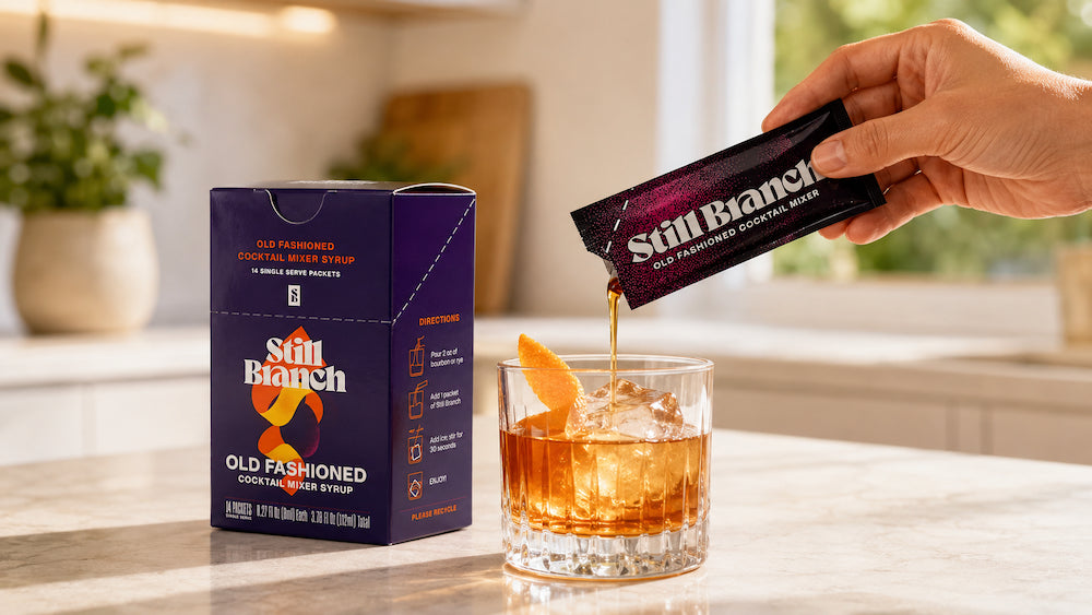 Still Branch packet making an easy Old Fashioned at home on a kitchen counter